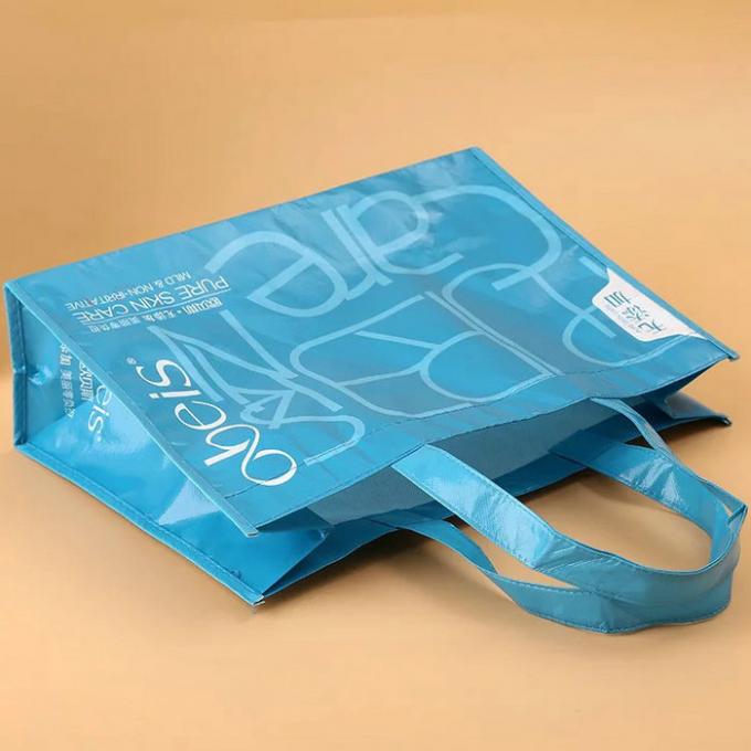 Borse non tessute pieghevoli del regalo del blu, borse riutilizzabili non tessute laminate